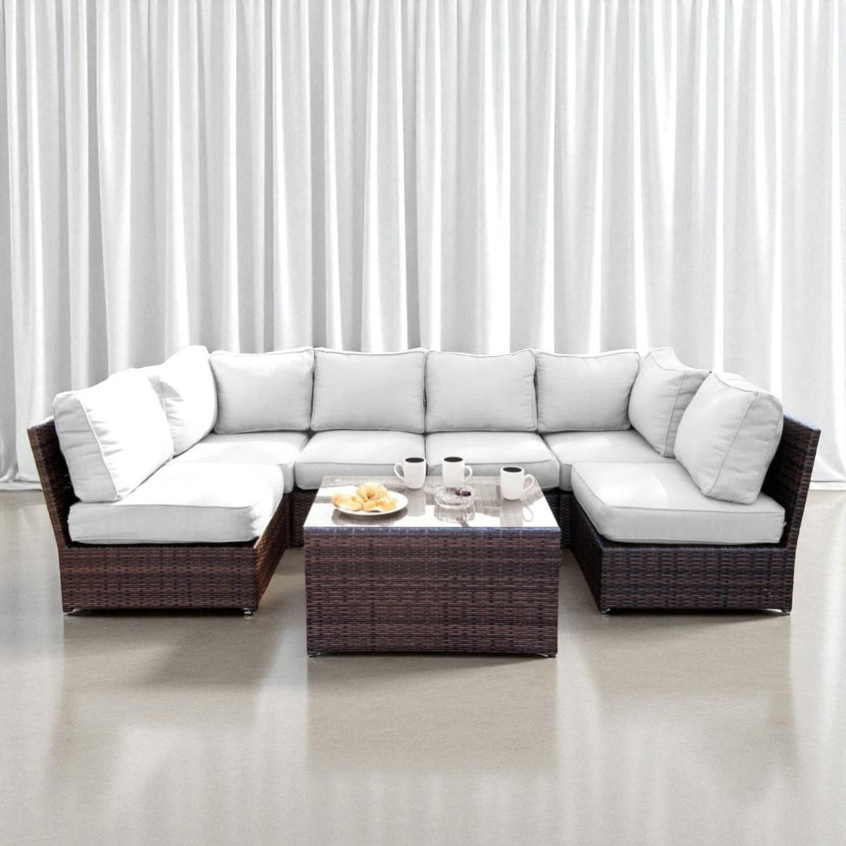 Outdoor Wicker Seating Set With Cushions and Coffee Table
